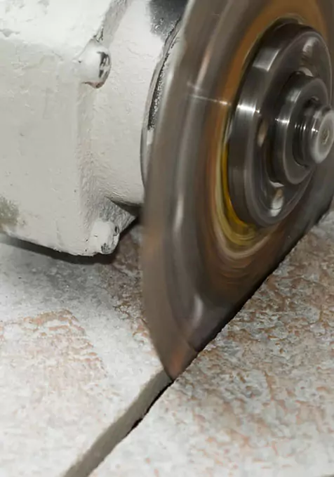 tile | Select Floors cutting tile for installation | Select Floors