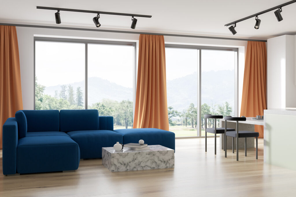 hardwood flooring in modern living room with mountains seen through the windows | Select Floors