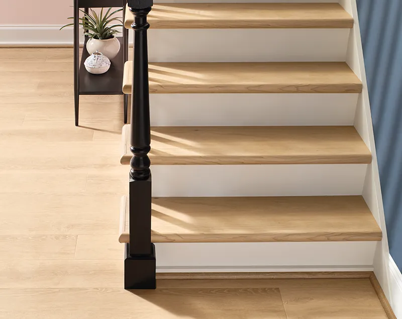 Staircase-Transitions Staircase Transitioning into matching color flooring | Select Floors