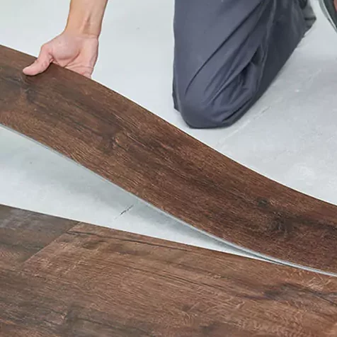 vinyl flooring being installed | Select Floors